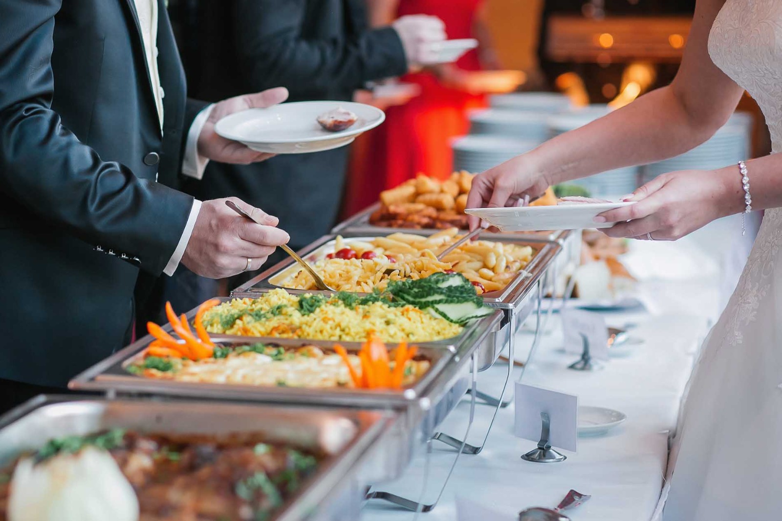 Chef cooking fresh catering food in a professional kitchen